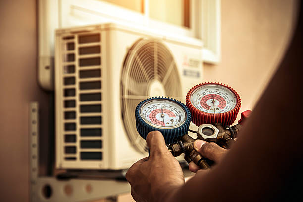 Professional Air Conditioning Service technician working in Beaver Dam, KY